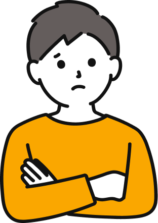 腕組みをして考えている男性